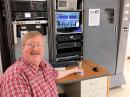 Assistant ARRL Lab Manager Bob Allison, WB1GCM, at the helm of W1INF. The Gates BC-1T is on the right.